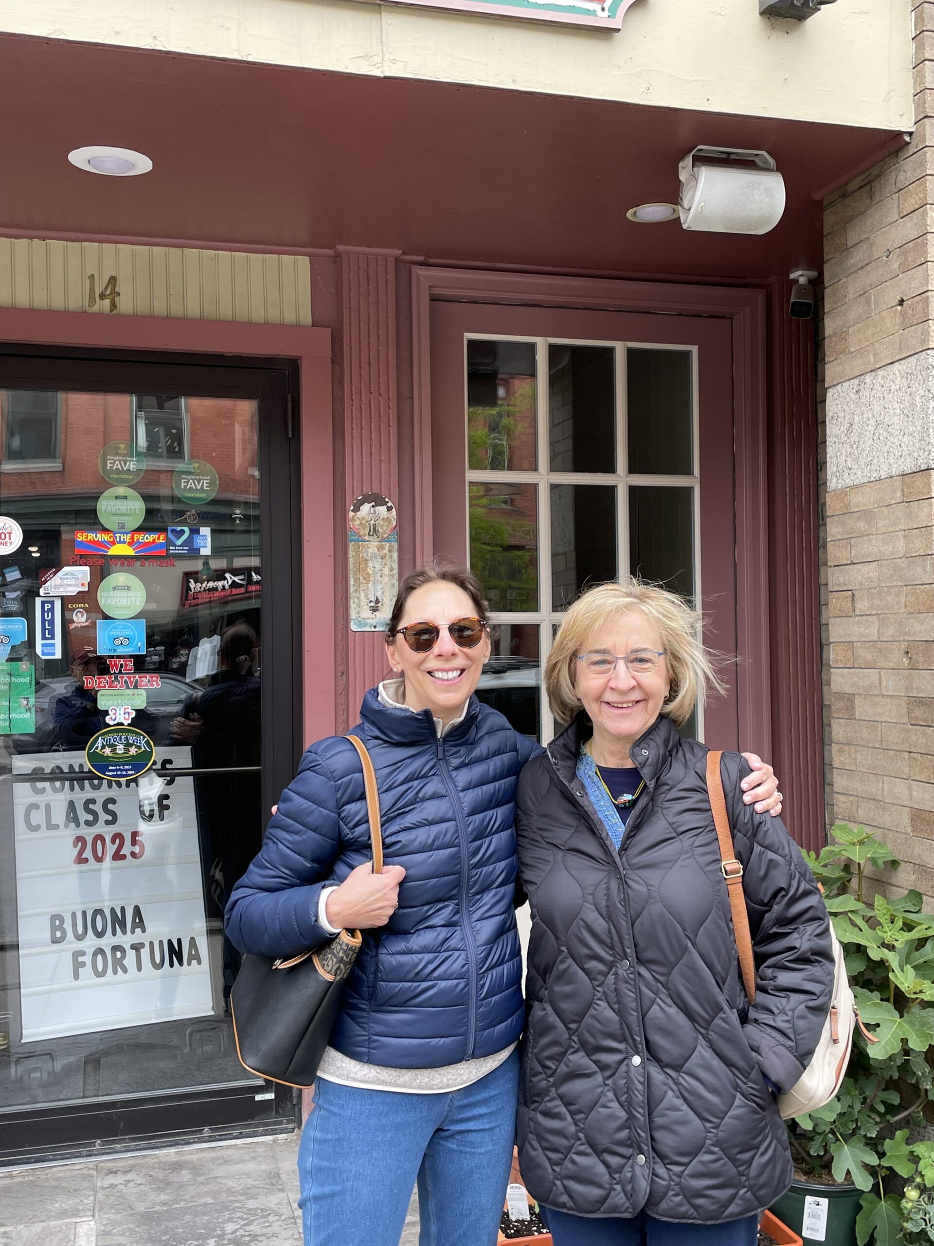 Reunion 2025 Robin Goldin Como & Alice Diamond outside their old apartment