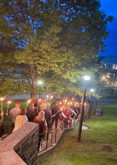 Reunion 2025, torchlight process headed down the Hill, , by Jim Bilbo